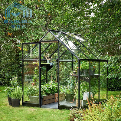 ヒマワリのガラス シートと園芸小型の温室のテント
